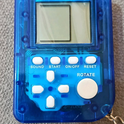 Game console keychain with many Tetris-style games new