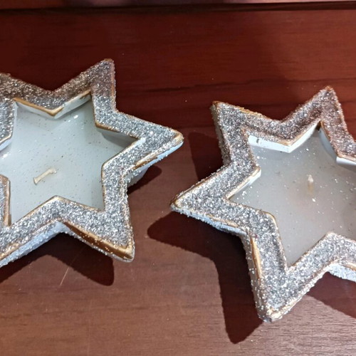 Christmas candles in clay stars with silver glitter new