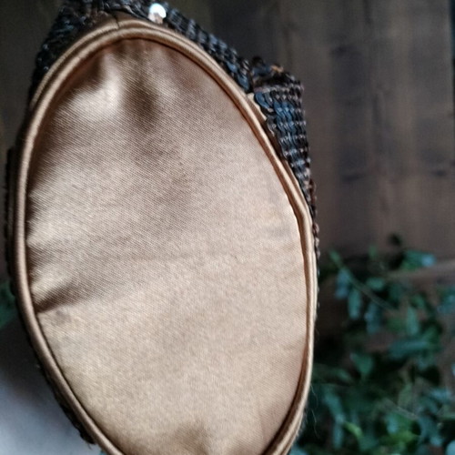 Pouch like new, gold copper with ribbon and sequins