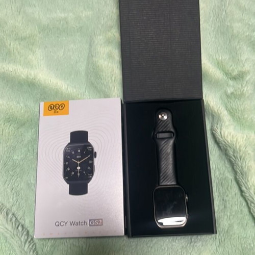QCY Watch new with charging cable compatible with iOS and Android