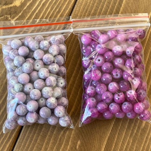 Bead pack like new, lilac and fuchsia colors