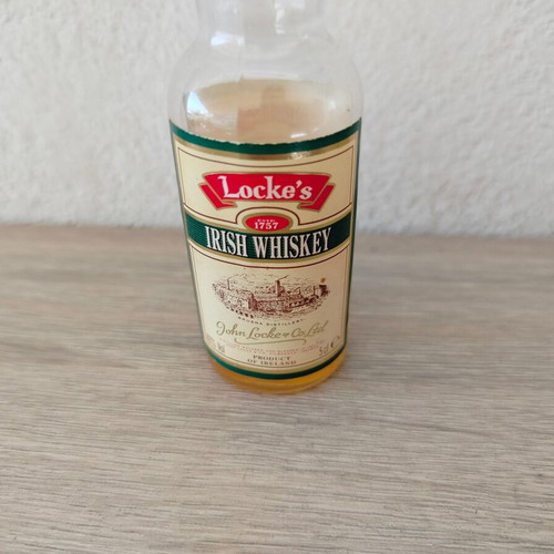 Locke's Irish Whiskey small promotional bottle used