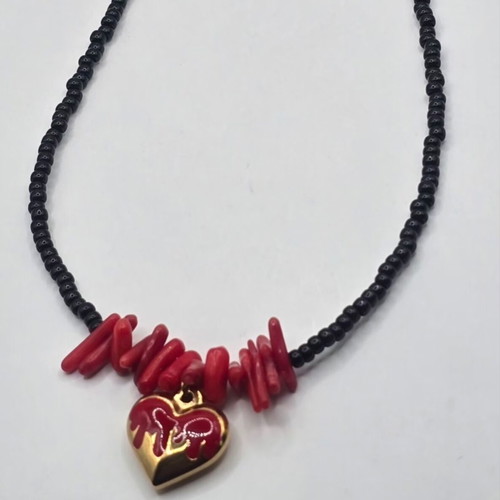 Handmade necklace with steel heart, black beads and red coral