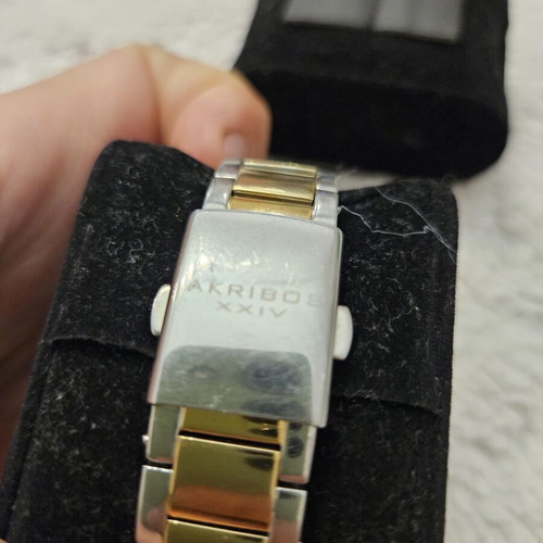 Akribos XXIV Diamond women's watch used, gold, stainless steel