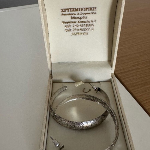 Silver hoop earrings with embossed floral design vintage chic