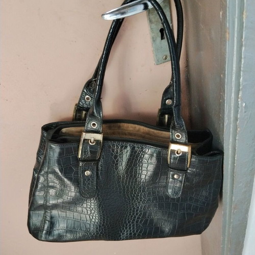 Vintage black women's shoulder bag with crocodile and snake texture, used