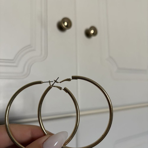 Gold color faux earrings used, slightly faded
