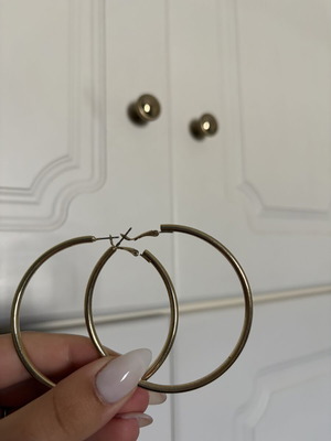 Gold color faux earrings used, slightly faded