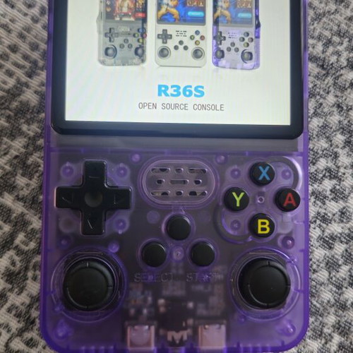 R36S handheld console like new with thousands of games