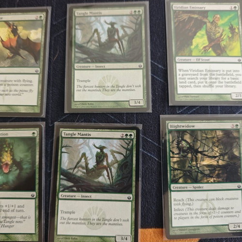 MTG Mirrodin Besieged 40 Cards Like New with Sleeves