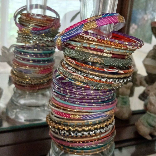Indian glass bracelets like new, set of 54, colorful and decorated