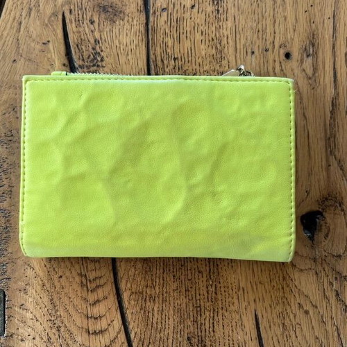 Axel wallet used in bright lime color