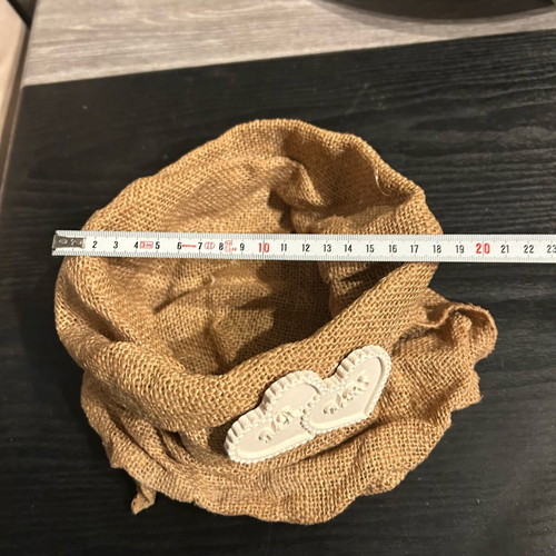 Hard pouch made of burlap with ceramic decoration like new
