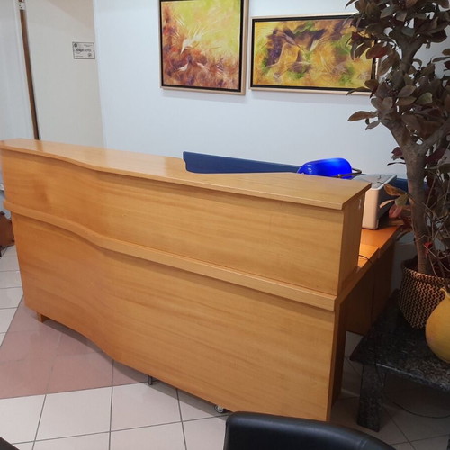 Professional reception desk used, made of beech with 4 drawers