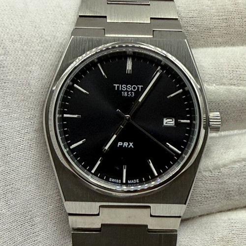 Tissot PRX Quartz watch with black dial