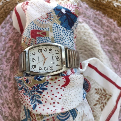 Women's silver watch used, stainless steel, elastic strap