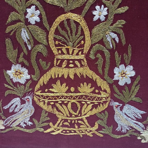 Embroidered textile painting used with gold thread on velvet