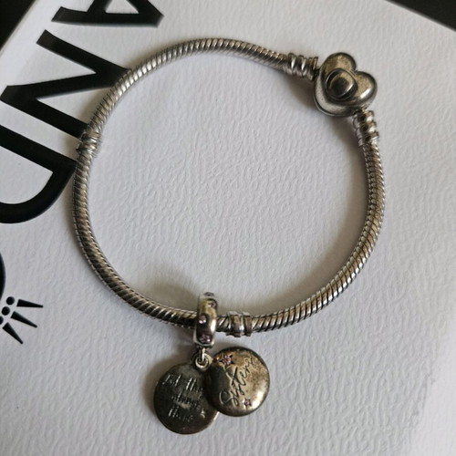 Pandora sterling silver charm bracelet with heart and sister charms like new