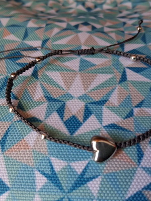 Macrame bracelet like new with decorative beads and heart