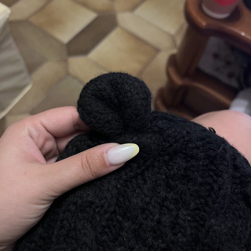 Knitted black hat with ears like new, one size