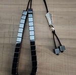 Handmade hematite worry beads with cube-shaped beads and silver shield