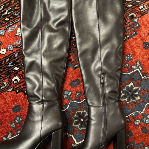 Black high boots made of smooth synthetic leather like new, size 38