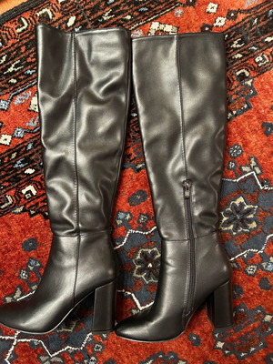 Black high boots made of smooth synthetic leather like new, size 38