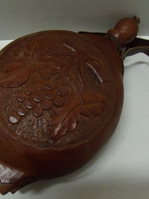 Old wooden canteen used with ornaments and wood carving