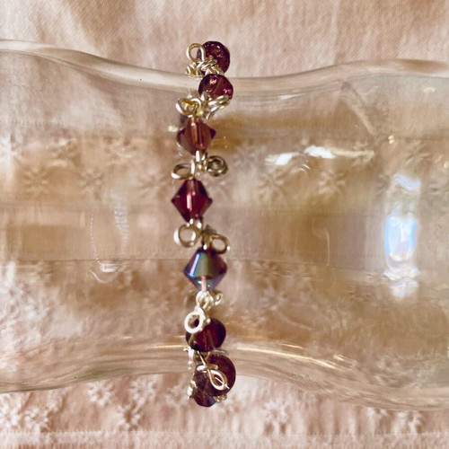 Handmade bracelet with amethyst-colored crystals and silver components new