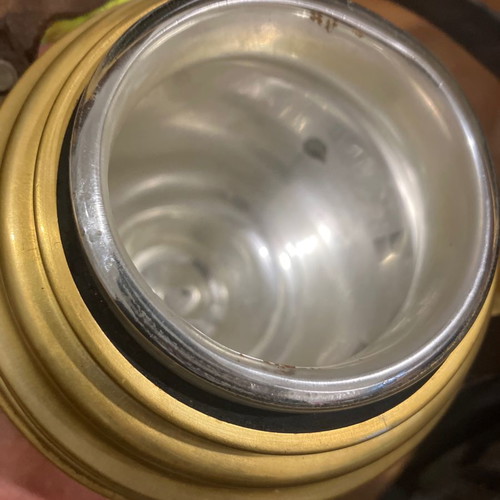 Vintage thermos used with cork and leather strap