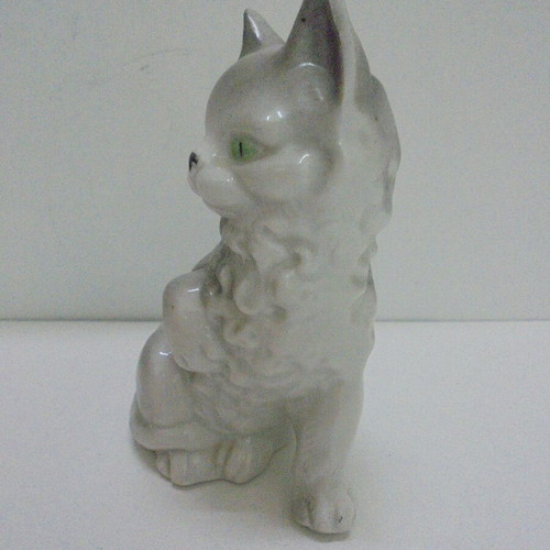 Vintage porcelain cat figurine, white-gray with green eyes