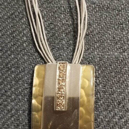 Modern women's necklace with large geometric pendant and rhinestones, like new