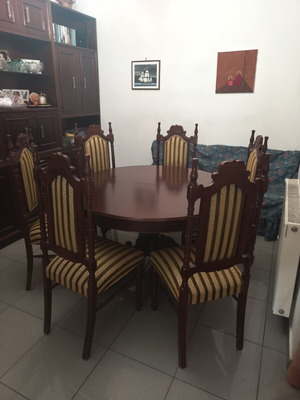 Round Dining Table with Its Chairs