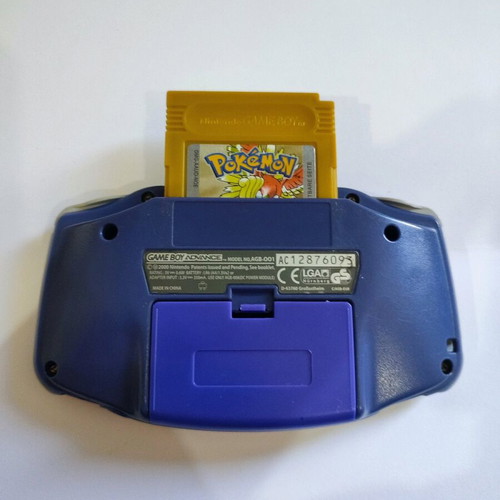 Game Boy Advance Nintendo Console used with Pokémon Gold cartridge