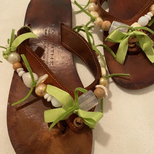 Leather slippers like new, decorated with beads and green ribbons, size 36