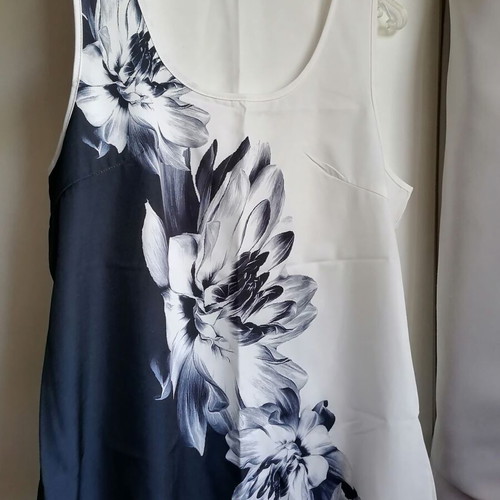 Sleeveless blouse size M, black and white with floral print