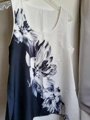 Sleeveless blouse size M, black and white with floral print