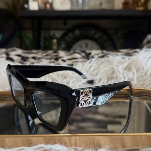 Cat Eye Sunglasses black like new with metal logo