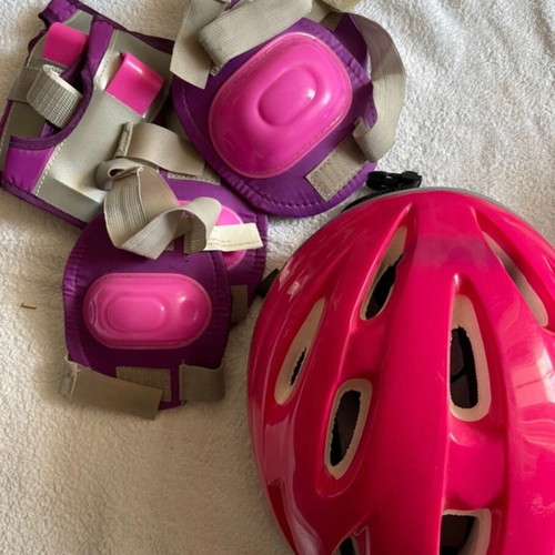 Knee pads used and bicycle helmet worn