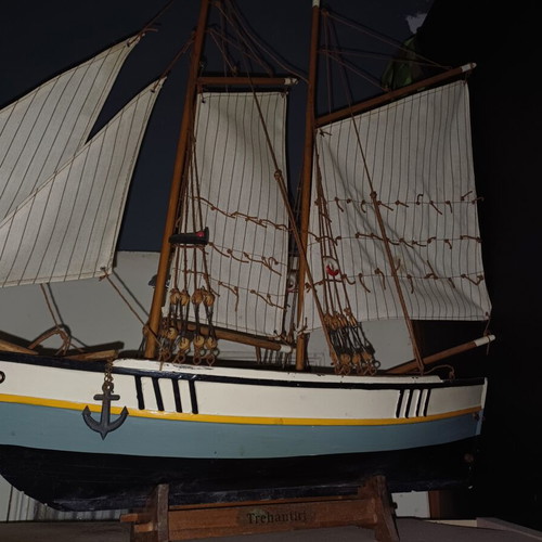 Decorative wooden ship and large handcrafted wooden boat