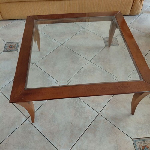 Classic coffee table used with wood and glass