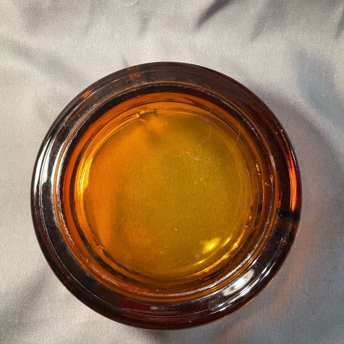 Glass ashtray like new, heavy orange vintage