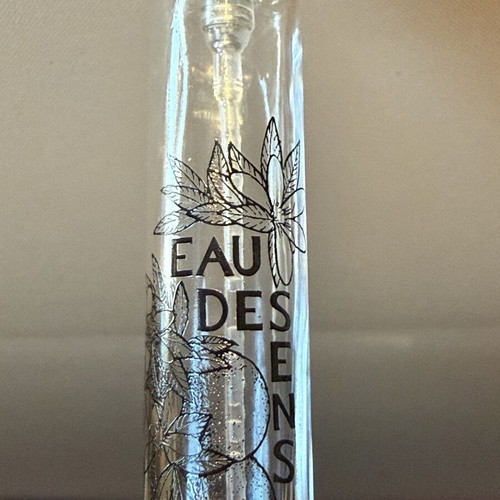 Diptique empty bottle with applicator used