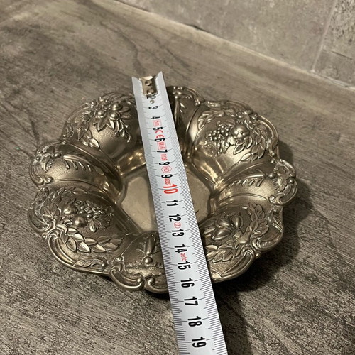 Decorative metal bowl used with embossed design