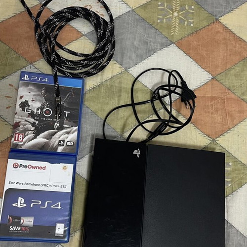 PlayStation 4 500GB console with two games, like new