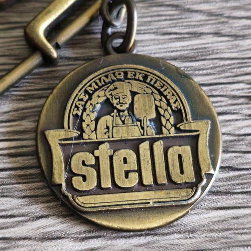 Stella pasta keychain used, vintage metal