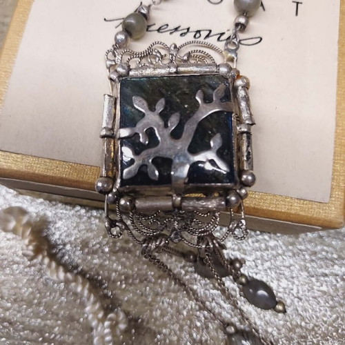 Nougat handmade necklace like new with filigree silver pendant