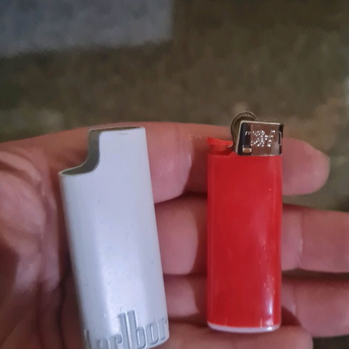 Metallic white mini lighter cases used, BiC type