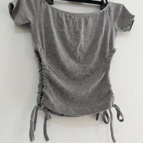 Women's gray blouse with short sleeves and drawstrings used, size S