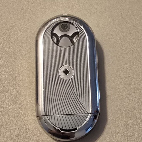 Motorola Aura phone like new, silver with spare battery and charger